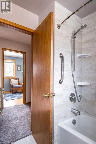 White subway tile surround in the shower and bathtub combination - 19 Chateau Court, Hamilton, ON - Indoor Photo Showing Bathroom