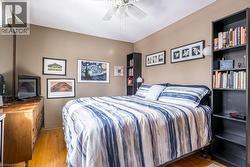 Warm-toned wall paint and hardwood flooring - 