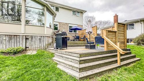 Multi-level wood deck featuring a privacy screen and integrated steps - 19 Chateau Court, Hamilton, ON - Outdoor With Deck Patio Veranda