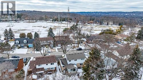 Aerial perspective of a residential street with homes featuring pitched roofs and varied exterior finishes - 19 Chateau Court, Hamilton, ON - Outdoor With View