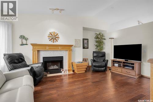 1 135 Pinehouse Drive, Saskatoon, SK - Indoor Photo Showing Living Room With Fireplace