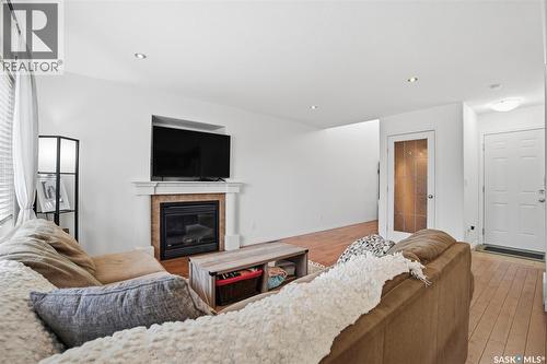 21 1600 Muzzy Drive, Prince Albert, SK - Indoor Photo Showing Living Room With Fireplace