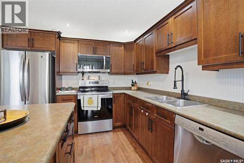 21 1600 Muzzy Drive, Prince Albert, SK - Indoor Photo Showing Kitchen With Double Sink