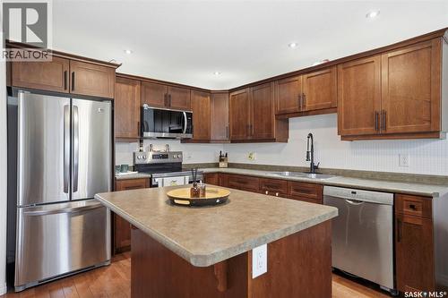 21 1600 Muzzy Drive, Prince Albert, SK - Indoor Photo Showing Kitchen With Double Sink