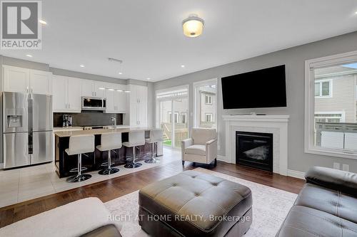 771 Devario Crescent, Ottawa, ON - Indoor Photo Showing Living Room With Fireplace