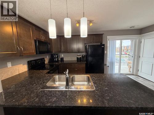 511 210 Rajput Way, Saskatoon, SK - Indoor Photo Showing Kitchen With Double Sink