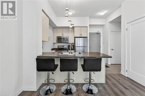 516 - 10 Concord Place, Grimsby, ON - Indoor Photo Showing Kitchen With Stainless Steel Kitchen