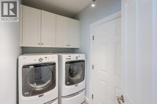 Laundry room main floor - access to garage - 6925 Chardonnay Place, Oliver, BC - Indoor Photo Showing Laundry Room