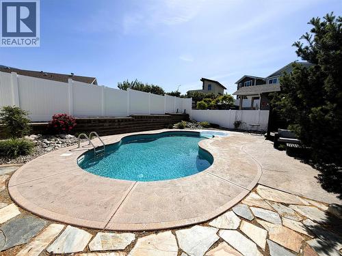 Summer photo - 6925 Chardonnay Place, Oliver, BC - Outdoor With In Ground Pool With Backyard
