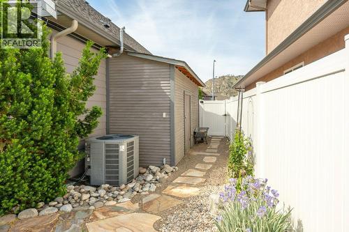 Side yard to pool shed - 6925 Chardonnay Place, Oliver, BC - Outdoor With Exterior