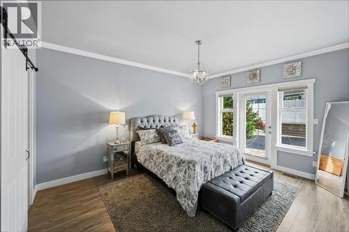 Primary bedroom - main floor - 6925 Chardonnay Place, Oliver, BC - Indoor Photo Showing Bedroom