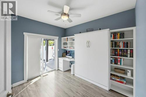 Bedroom with murphy bed & access to back yard - 6925 Chardonnay Place, Oliver, BC - Indoor