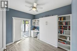 Bedroom with murphy bed & access to back yard - 