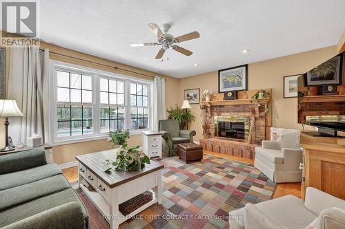 26 Paddy Dunn'S Circle, Springwater, ON - Indoor Photo Showing Living Room With Fireplace