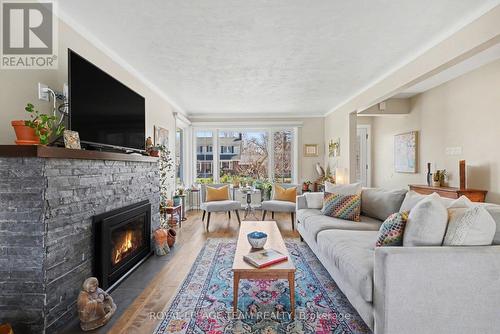 2149 Dublin Avenue, Ottawa, ON - Indoor Photo Showing Living Room With Fireplace
