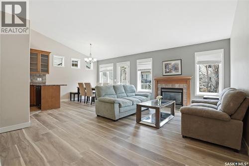 105 615 Stensrud Road, Saskatoon, SK - Indoor Photo Showing Living Room With Fireplace