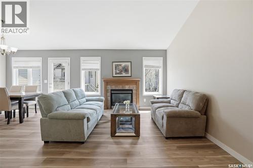 105 615 Stensrud Road, Saskatoon, SK - Indoor Photo Showing Living Room With Fireplace