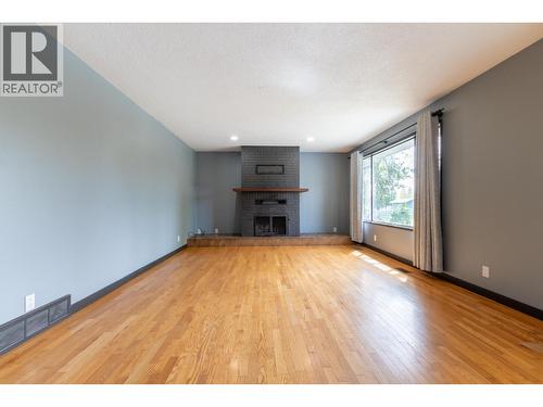 4608 Crocus Crescent, Prince George, BC - Indoor Photo Showing Living Room With Fireplace