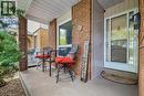 Covered front porch featuring brick columns and a white soffit - 21 Lionshead Lookout, Brampton, ON  - Outdoor With Deck Patio Veranda With Exterior 