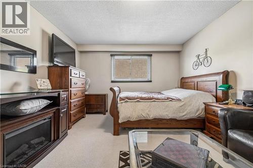 Bedroom featuring light-colored carpeting, a window with horizontal blinds, and neutral wall tones - 21 Lionshead Lookout, Brampton, ON - Indoor Photo Showing Bedroom