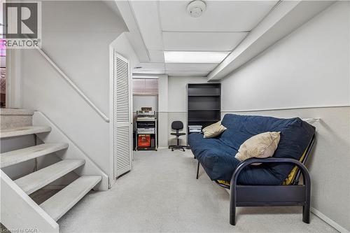 Finished basement space featuring carpeted flooring, painted walls, and a drop ceiling - 21 Lionshead Lookout, Brampton, ON - Indoor Photo Showing Other Room