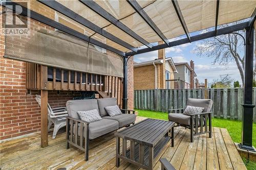 Expansive outdoor deck featuring a pergola with a retractable canopy - 21 Lionshead Lookout, Brampton, ON - Outdoor With Deck Patio Veranda
