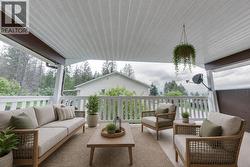Visualization of covered deck with patio furniture. - 