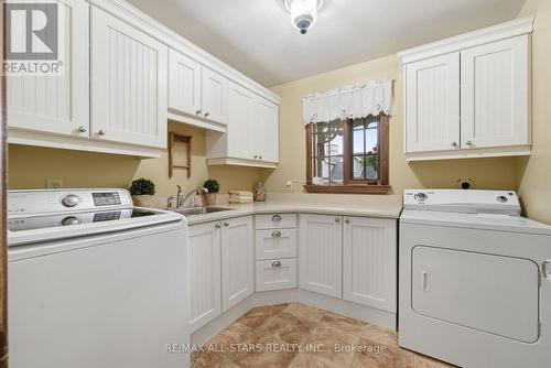 Main Floor Laundry - 4271 Fallis Road, Scugog, ON - Indoor Photo Showing Basement