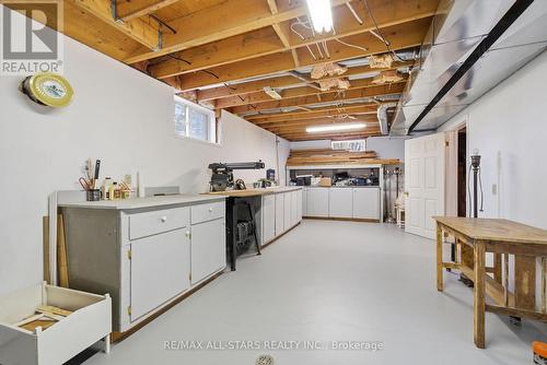 Workshop in Basement of House - 4271 Fallis Road, Scugog, ON - Indoor Photo Showing Garage