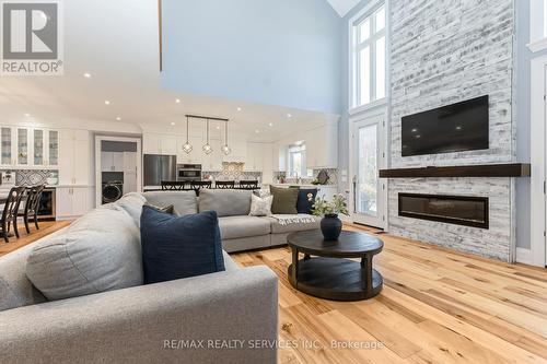833180 4Th Line Ehs, Mono, ON - Indoor Photo Showing Living Room With Fireplace