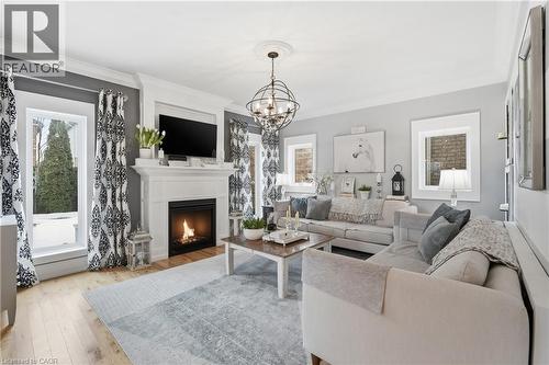 36 Pavilion Drive, Binbrook, ON - Indoor Photo Showing Living Room With Fireplace