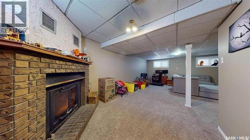 1126 Brett Bay, Regina, SK - Indoor With Fireplace