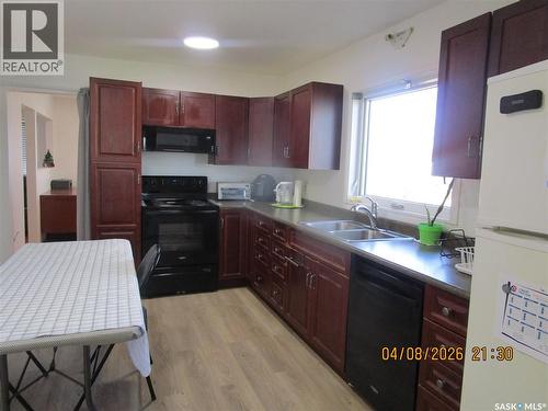233 4Th Avenue E, Gravelbourg, SK - Indoor Photo Showing Kitchen With Double Sink