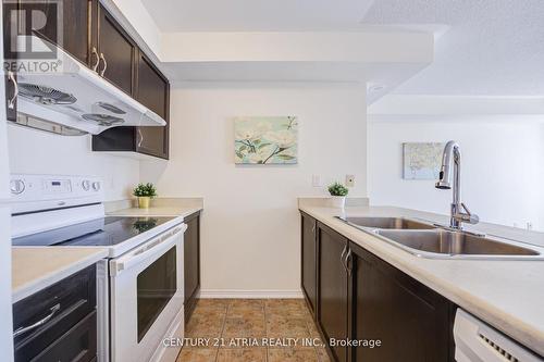 5 - 129 Isaac Devins Boulevard, Toronto, ON - Indoor Photo Showing Kitchen With Double Sink