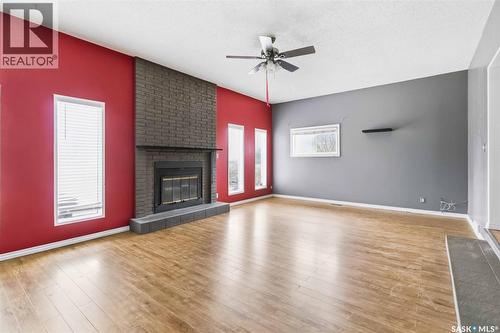 445 U Avenue S, Saskatoon, SK - Indoor Photo Showing Living Room With Fireplace