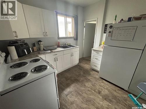 112 Stovel Avenue E, Melfort, SK - Indoor Photo Showing Kitchen With Double Sink