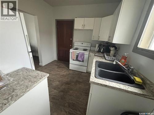 112 Stovel Avenue E, Melfort, SK - Indoor Photo Showing Kitchen With Double Sink