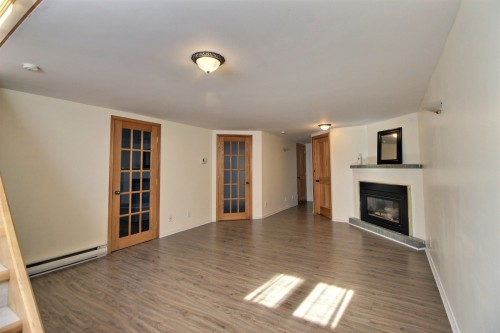 Salle familiale - 762 5E Avenue O., Amos, QC - Indoor Photo Showing Living Room With Fireplace