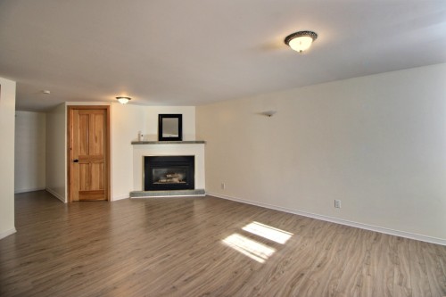 Salle familiale - 762 5E Avenue O., Amos, QC - Indoor Photo Showing Living Room With Fireplace