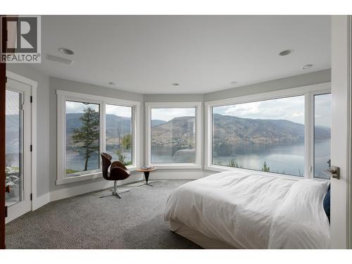 Bedroom full views walkout to outdoor sauna - 228 Caliburn Court, Kelowna, BC - Indoor Photo Showing Bedroom
