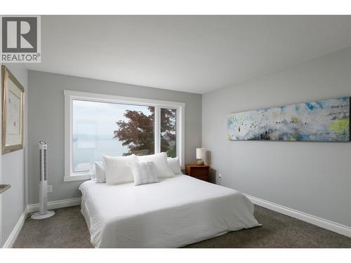 Bedroom with Big Views - 228 Caliburn Court, Kelowna, BC - Indoor Photo Showing Bedroom