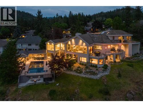 Evening at the Hideaway - 228 Caliburn Court, Kelowna, BC - Outdoor With Deck Patio Veranda