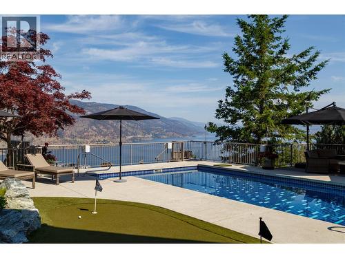 Putting Green - 228 Caliburn Court, Kelowna, BC - Outdoor With In Ground Pool