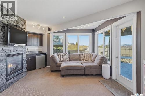 231 Willowgrove Boulevard, Saskatoon, SK - Indoor Photo Showing Living Room With Fireplace