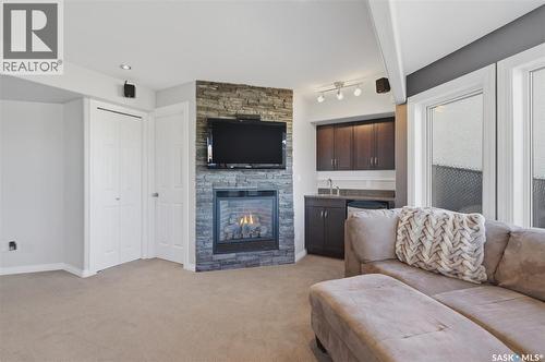 231 Willowgrove Boulevard, Saskatoon, SK - Indoor Photo Showing Living Room With Fireplace