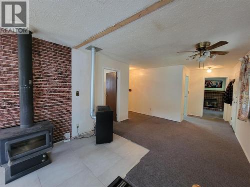 981 Scott Avenue, Hedley, BC - Indoor Photo Showing Other Room With Fireplace