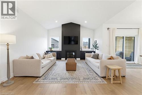 24 Gilmer Crescent, Listowel, ON - Indoor Photo Showing Living Room With Fireplace