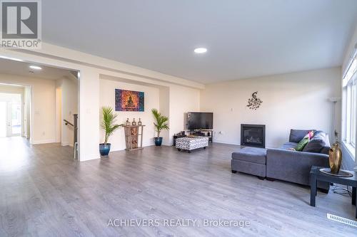 47 Daffodil Road, Springwater, ON - Indoor Photo Showing Living Room With Fireplace