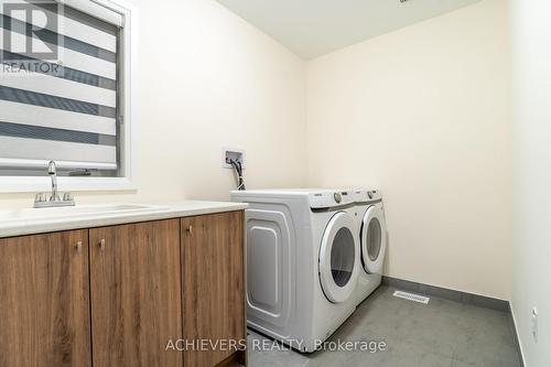 47 Daffodil Road, Springwater, ON - Indoor Photo Showing Laundry Room