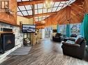 105 Otter Crescent, Beaver Flat, SK  - Indoor Photo Showing Living Room With Fireplace 